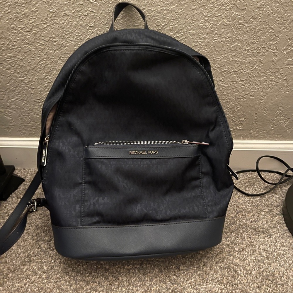 Michael kors backpack hasn’t been used.